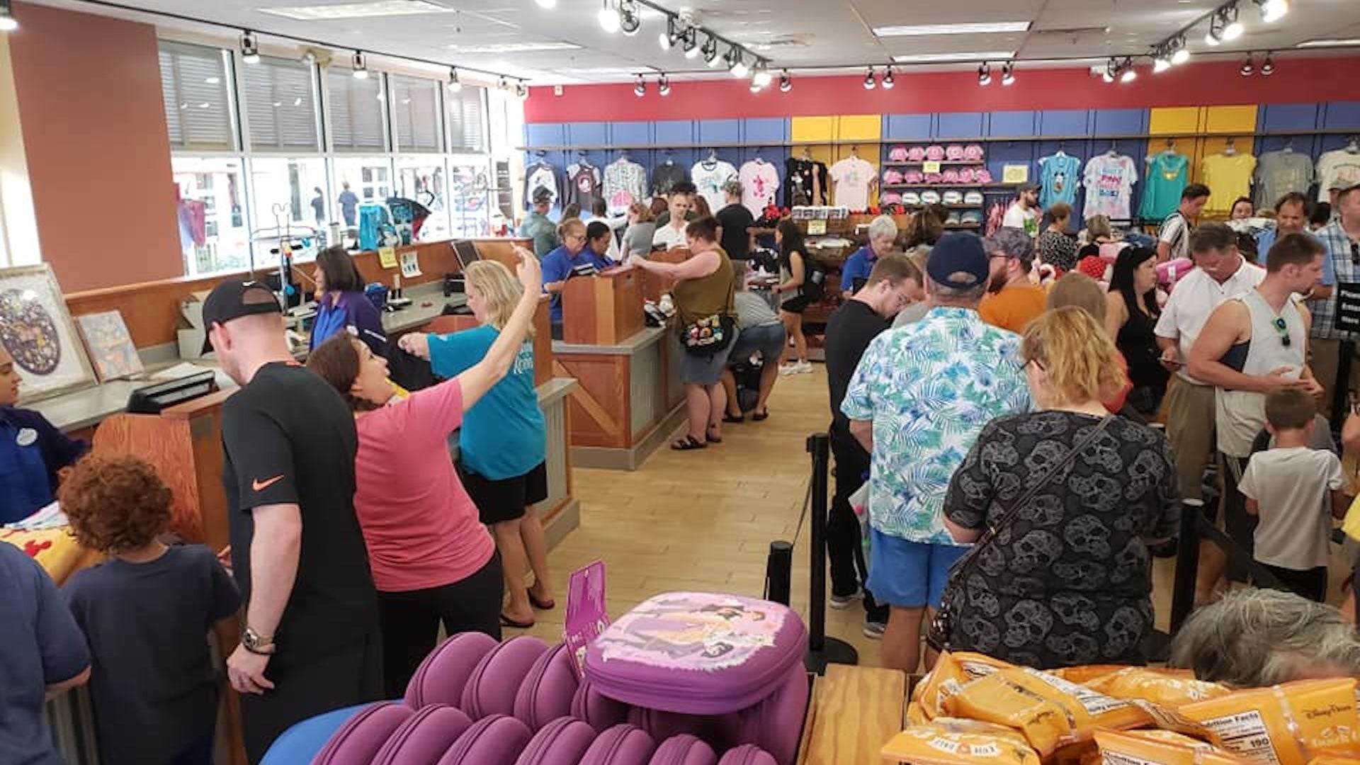 many people buying and checking out at Disney Character Warehouse, Orlando